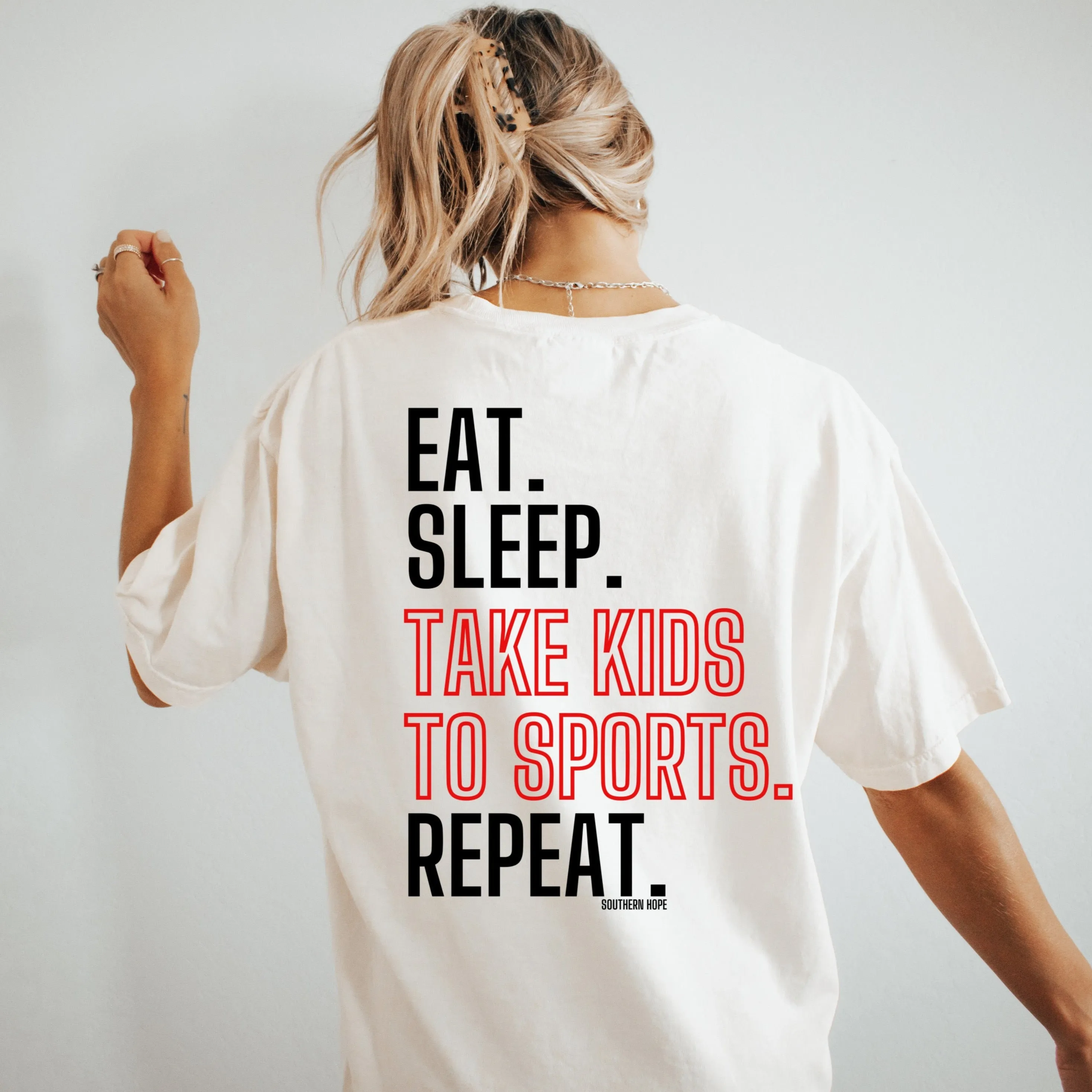 (Ivory/Back) Eat, Sleep, Take Kids To Sports, Repeat Short Sleeve Adult Tee