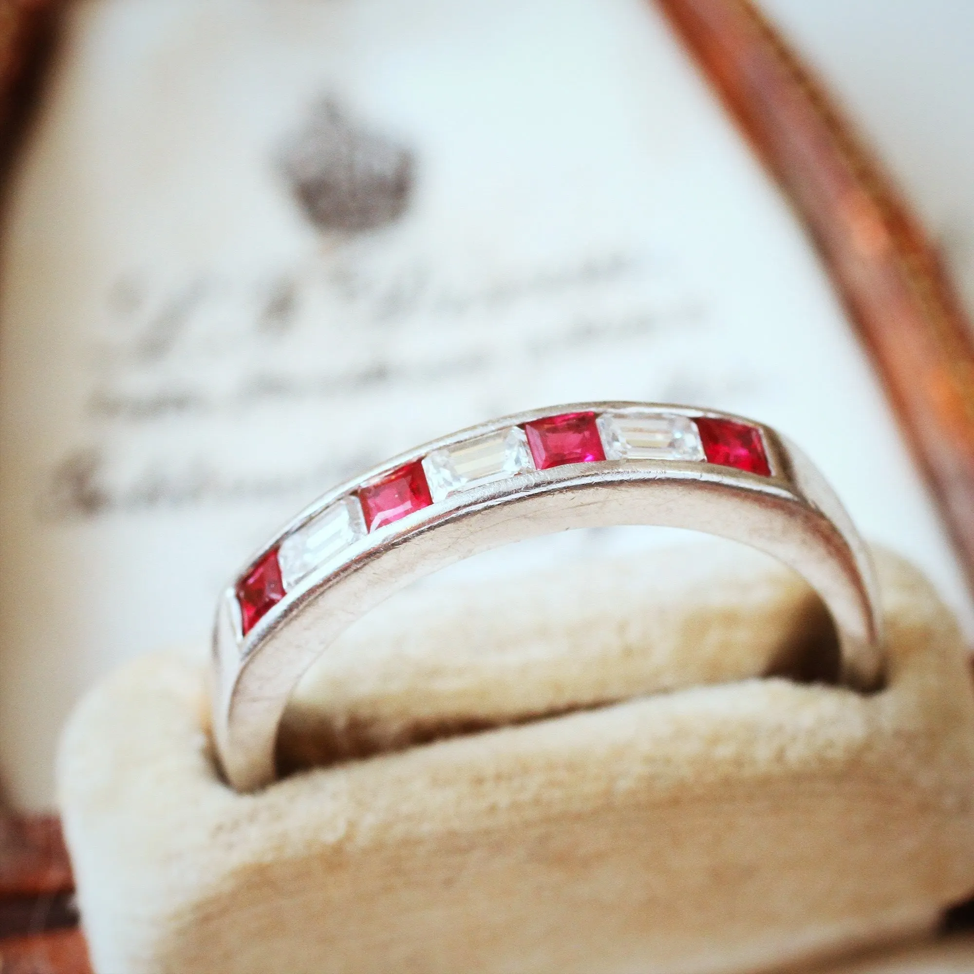 Pristine Ruby and Emerald Cut Diamond Band